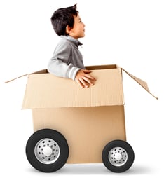 Boy in a car made of cardboard box - express delivery concepts-1