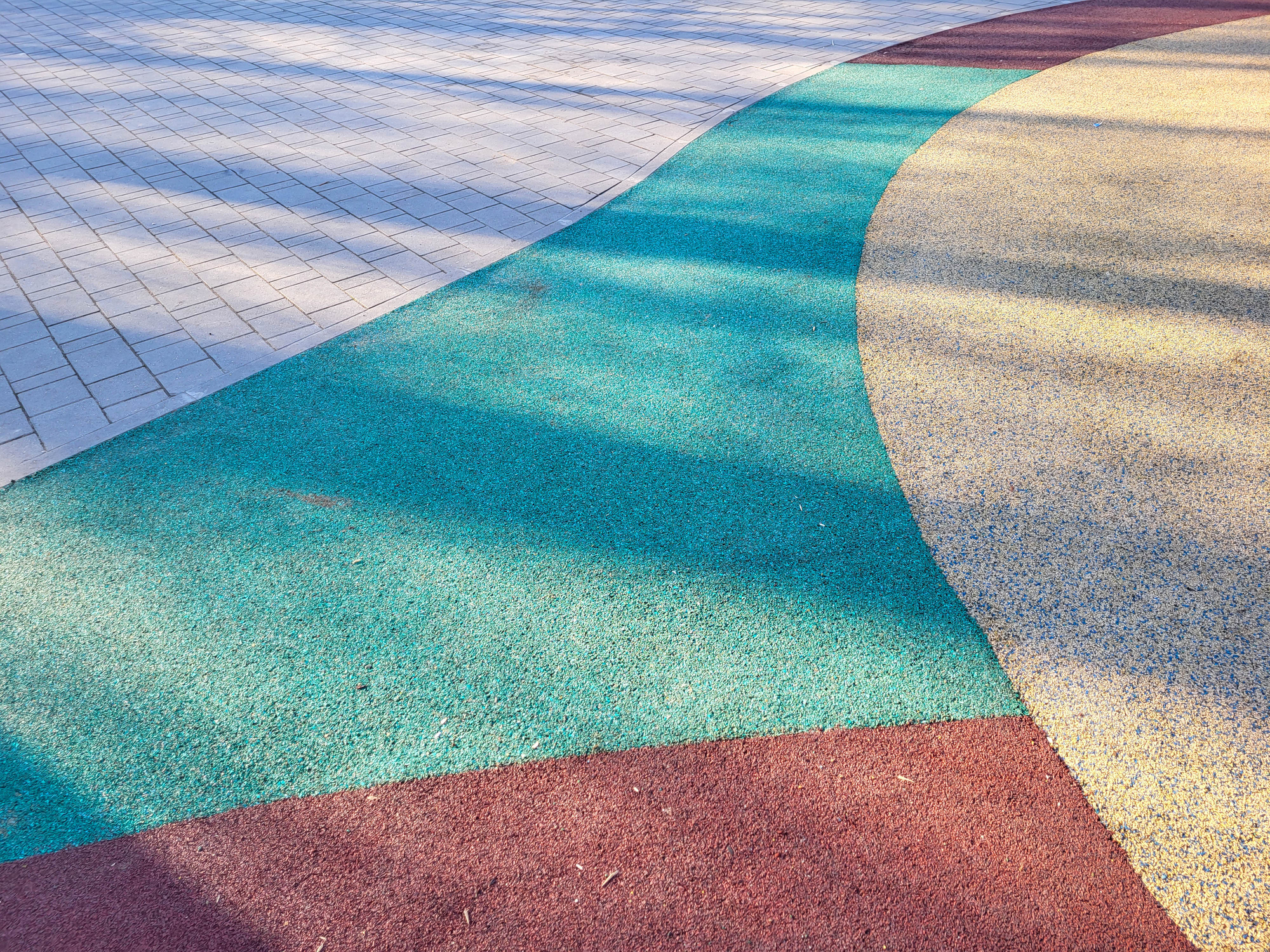 Colorful background of the rubber coating of the outdoor sports ground
