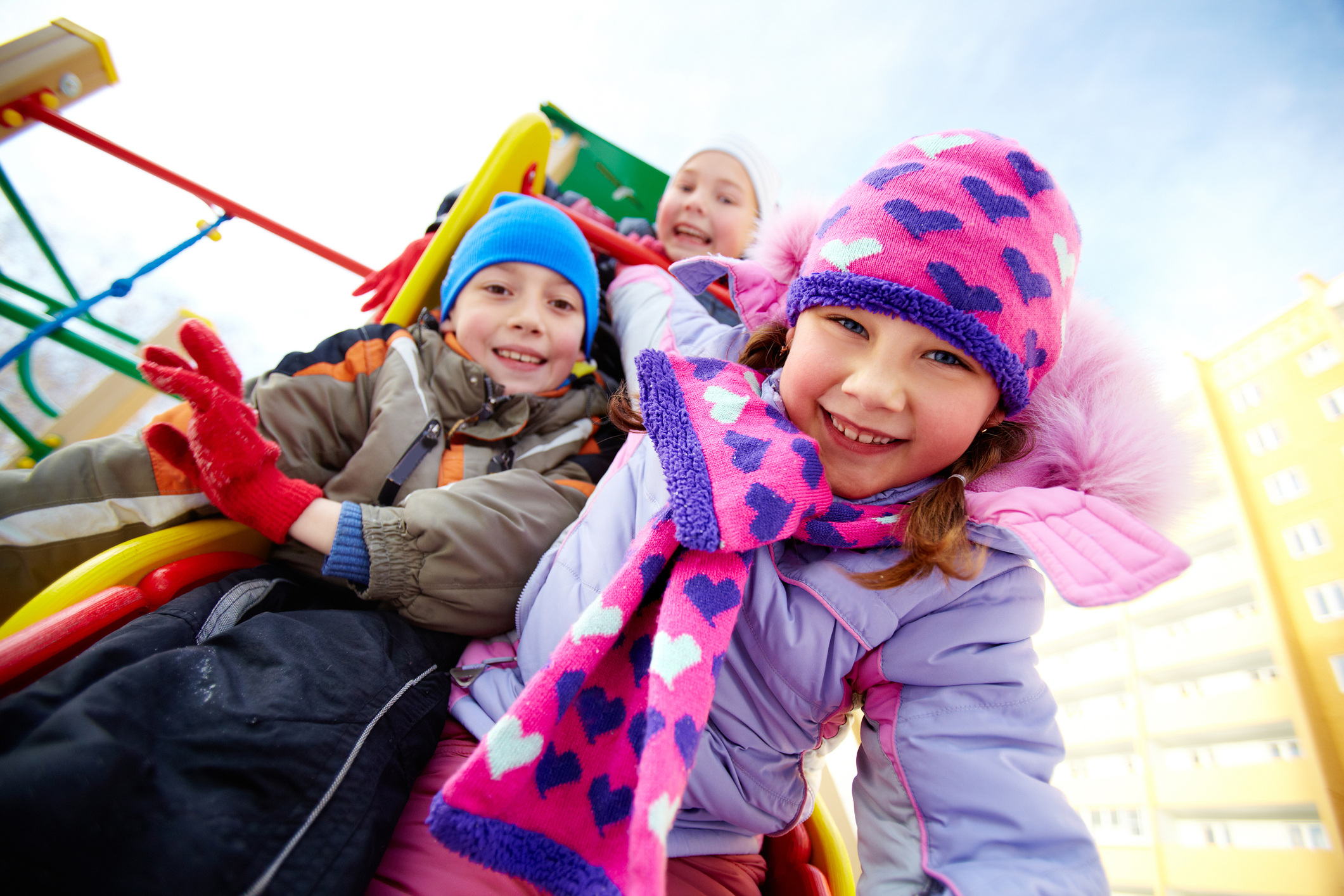 Girl playing outside with her friends