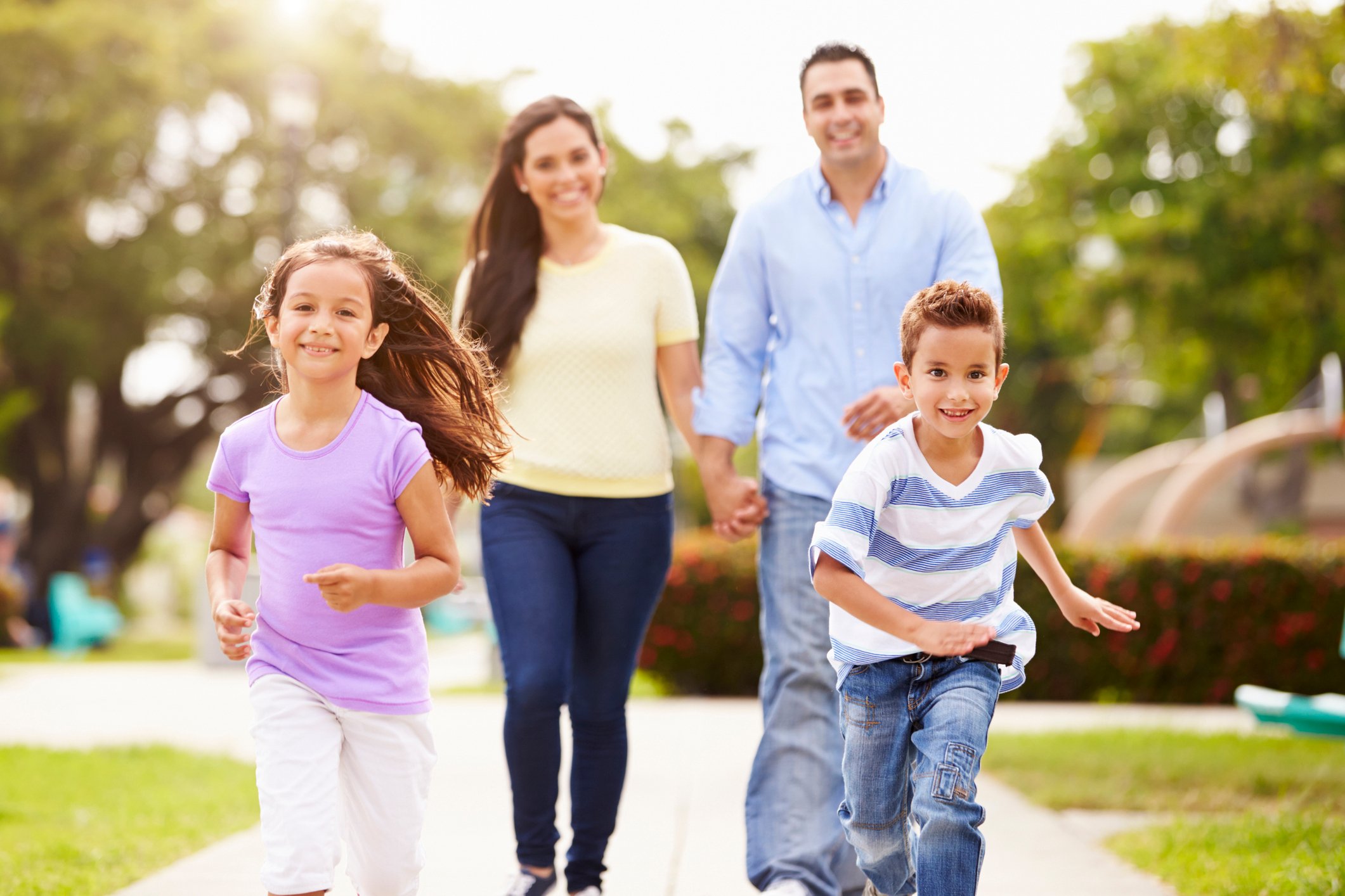 Family walking in park together